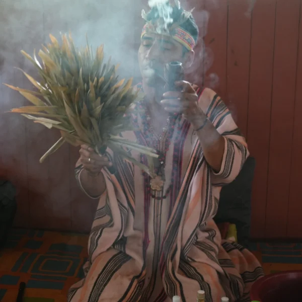shaman blowing smoke 1